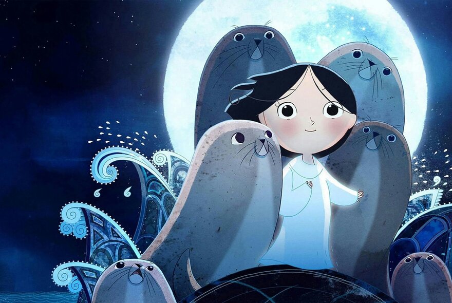 A hand-drawn animation still from the film Song of the Sea, featuring a young girl standing on a rocky shore surrounded by several grey seals under a large, bright full moon and a dark blue night sky.