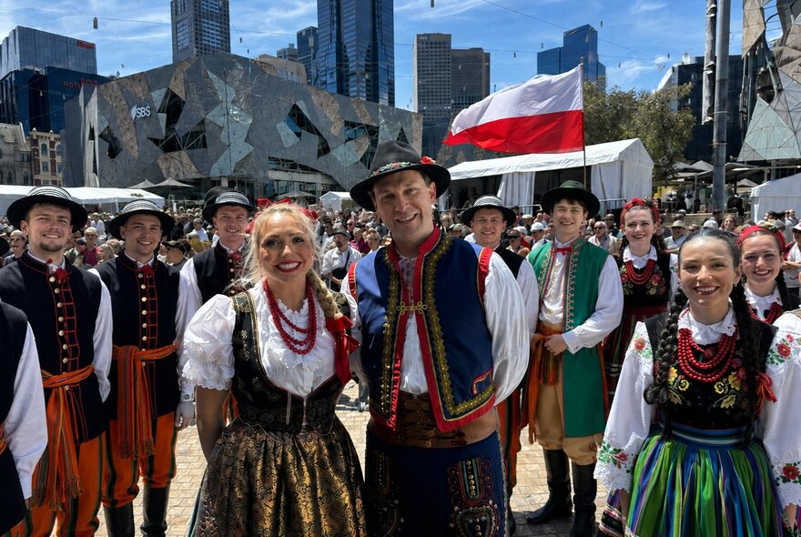 People in Polish traditional dress in Federation Square. 