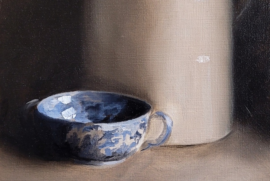 Oil painting of a blue and white ceramic cup and white vase.
