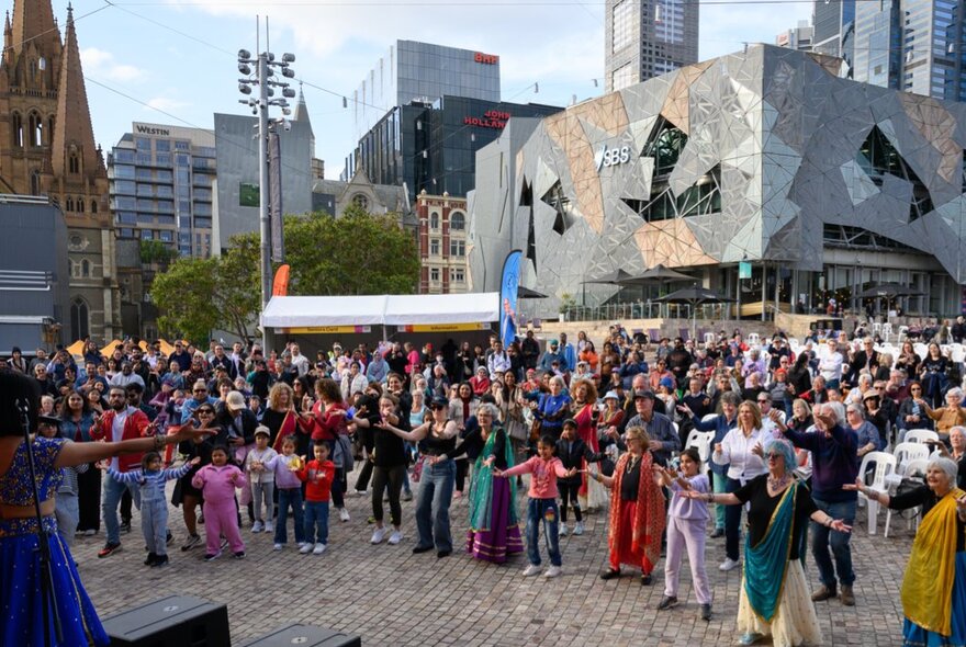 A crowd of people at Melbourne's Fed Square.