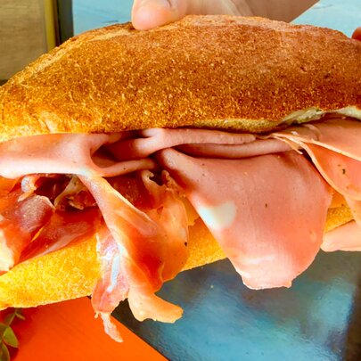 A mortadella sandwich.