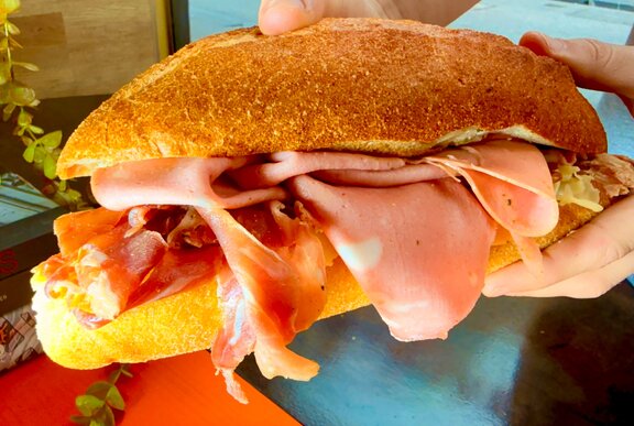 A mortadella sandwich.