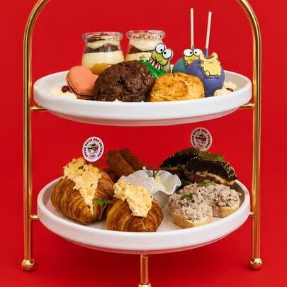 A tiered High Tea plate of savoury and sweet food served at Hello Kitty and Friends cafe