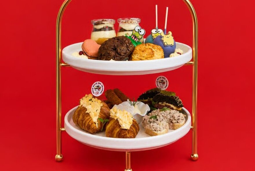 A tiered High Tea plate of savoury and sweet food served at Hello Kitty and Friends cafe