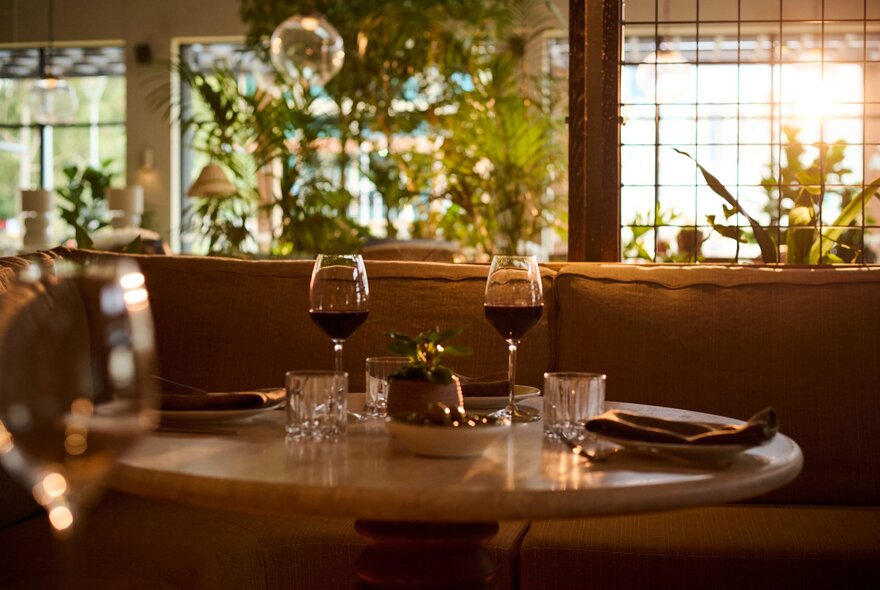 A table set for service inside the lobby of 1 Hotel Melbourne.