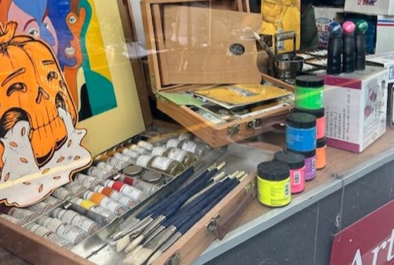 Painting and art supplies for sale in an art supplies shop.