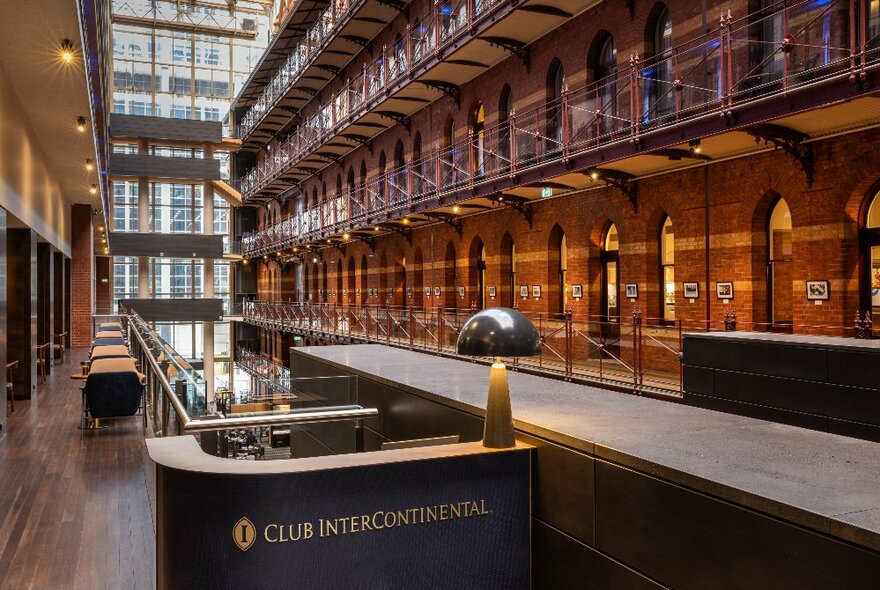 The counter of the upper level Club Intercontinental that shows the multi level internal balconies leading to rooms.