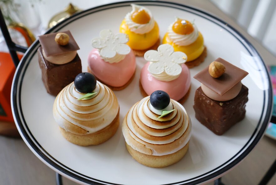 A plate of small dessert treats as part of a high tea.