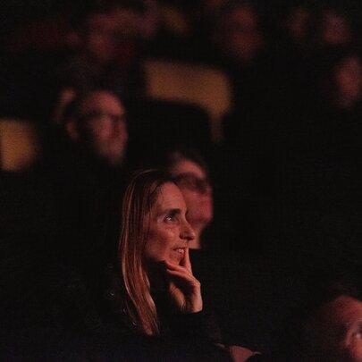 An audience watching a film.