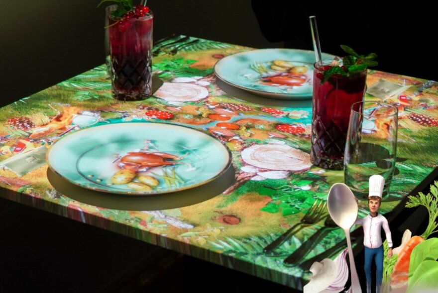 Dining table set for dinner with two fish-themed plates and glasses, seafood-themed tablecloth.