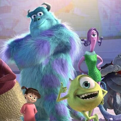 A still showing the characters from the animated film Moncters Inc., including Sulley, Mike Wazowski and Boo.