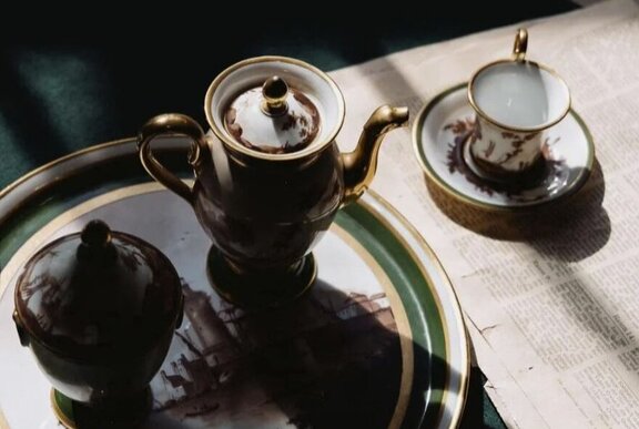 Table tray set with coffee pot and cup and saucer.