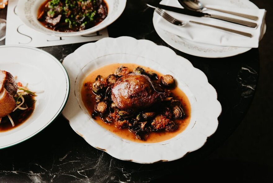 Food served on plates with scalloped edges.