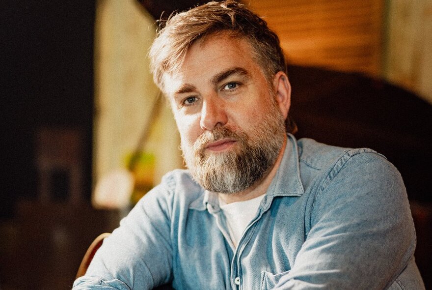 Portrait of award-winning children’s book author and musician Josh Pyke.