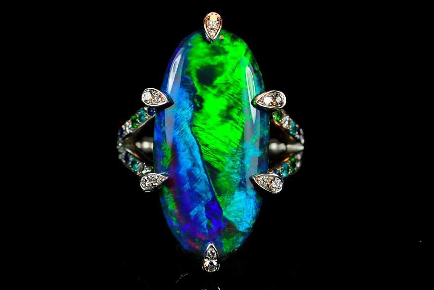 A rare blue green opal set with diamonds.