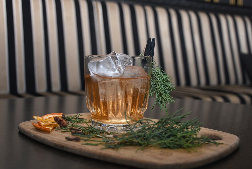 A cocktail on a serving platter.