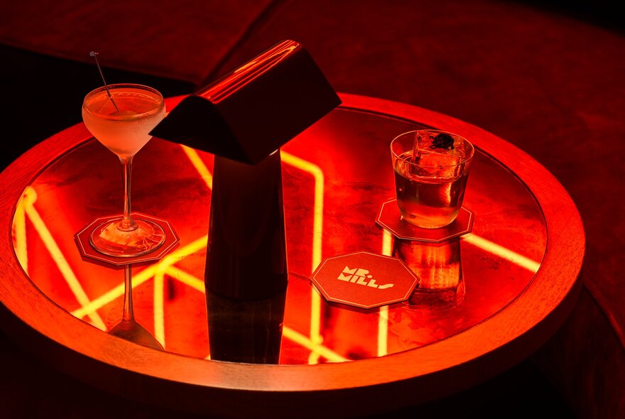 Drinks on a low table inside the bar Mr Mills.