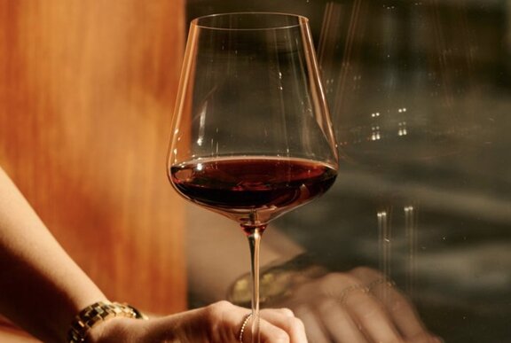 A glass of red wine.