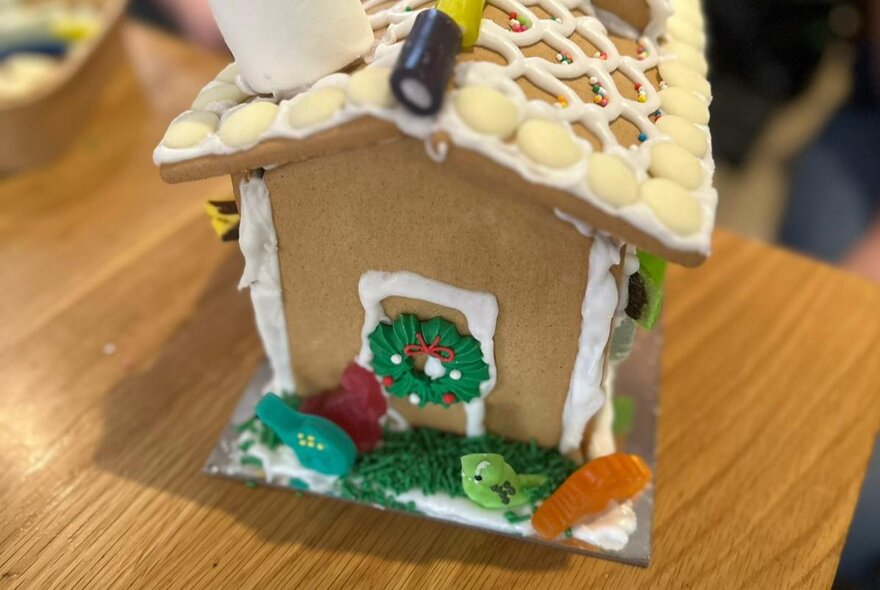 A decorated gingerbread house. 