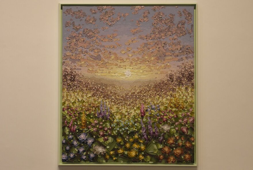 A pointillist style landscape painting of a field of flowers beneath a luminous, cloud-filled sunset sky.
