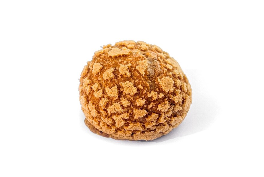 A brown coloured cookie.