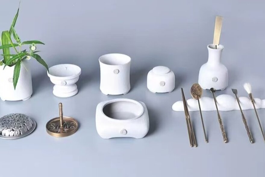 Selection of white ceramic Chinese bowls and incense utensils.