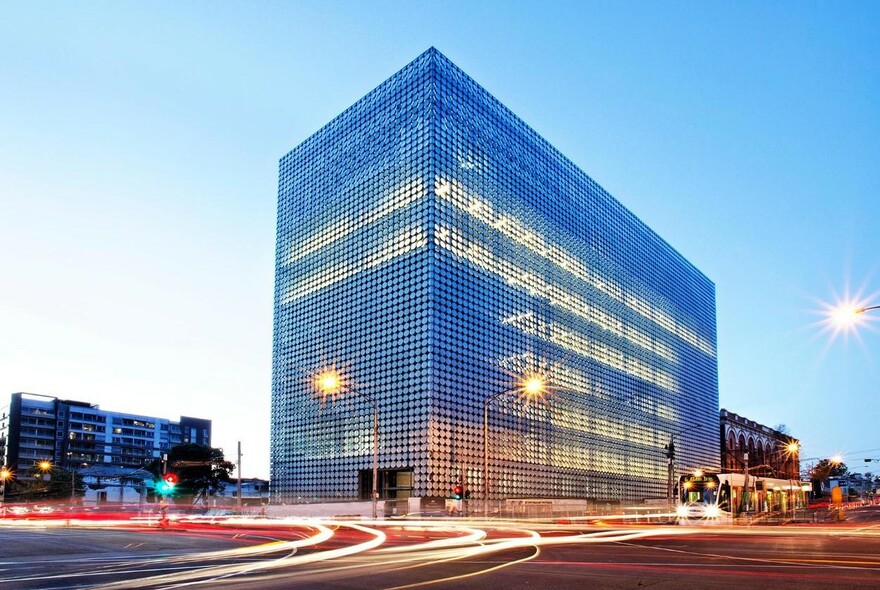 RMIT Design Hub building at dusk.