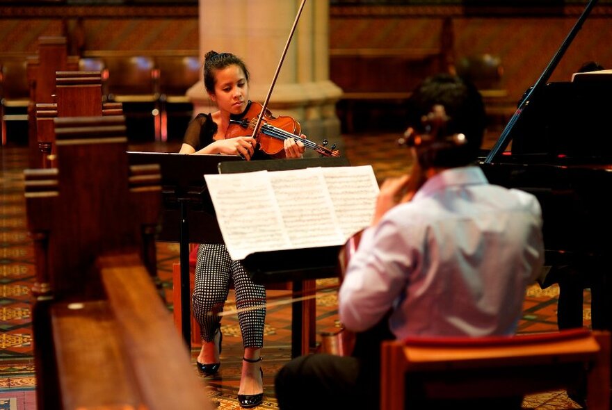 A violinist plays in St Paul's Cathedral. 