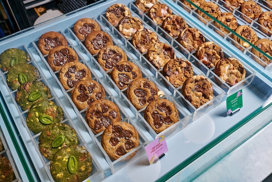 A display of different flavoured cookies with chunky fillings.