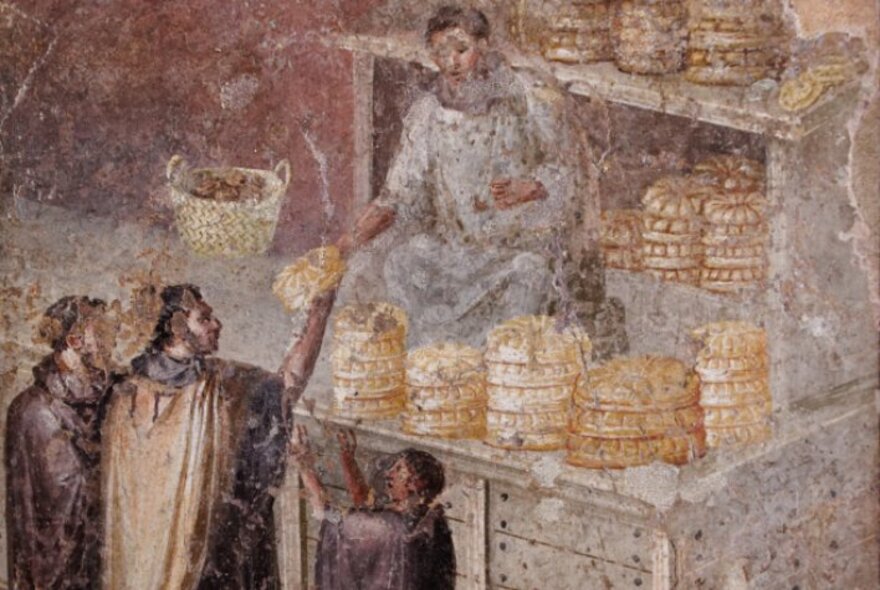 Ancient Roman fresco representing people buying bread loaves from a baker at an ancient market stall.