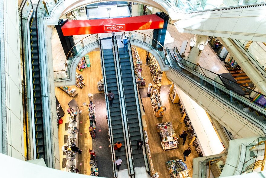 Looking down escalators to Dymocks basement bookshop.