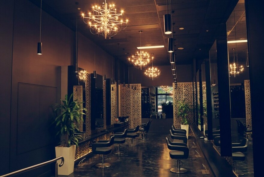 Dimly lit interior of Manhor Men's Grooming Lounge.