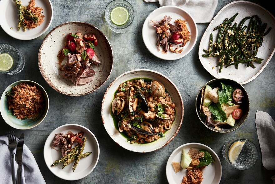 A range of Middle Eastern dishes, viewed from above.