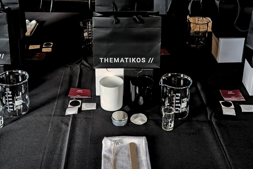 A table prepared with tools and ingredients ready for a candle making workshop at the  Hellenic Museum.