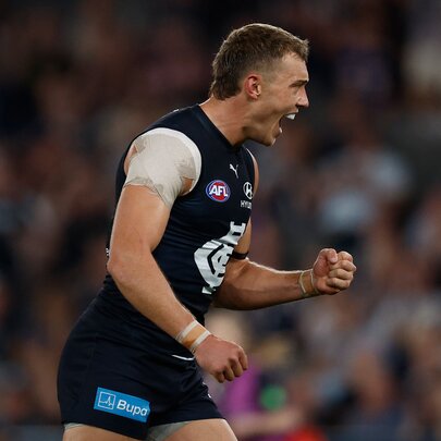 Carlton AFL football player on the field during a match.