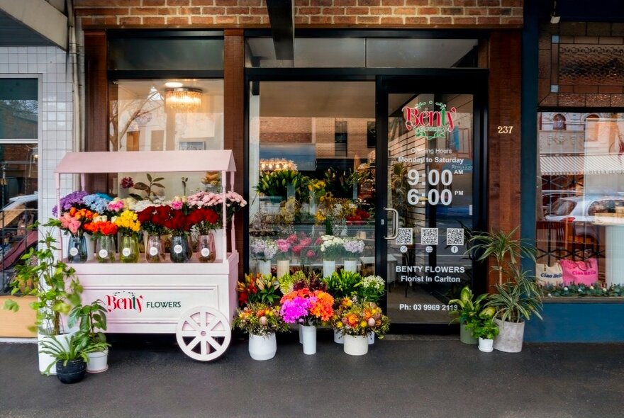 The window-front of Benty Flowers, with sample bouquets on the footpath outside the shop.