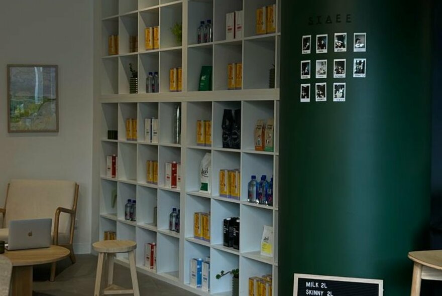 Shelves filled with coffee and brewing supplies.