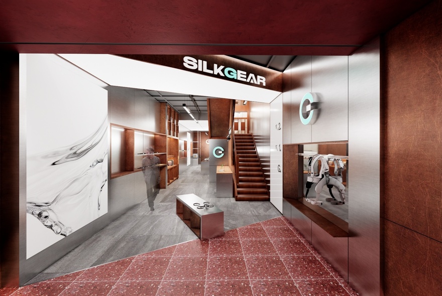 Interior of SilkGear store, featuring a modern design with wood and metal elements.