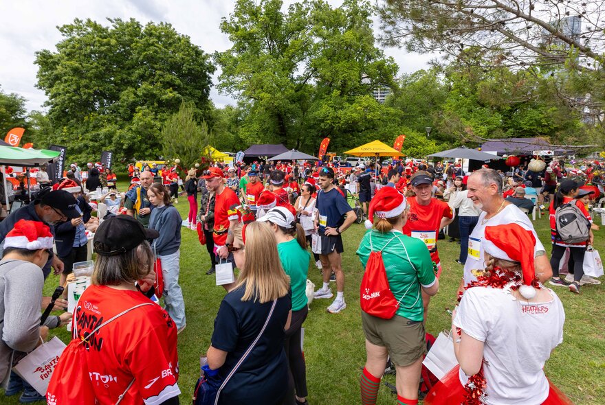A group of people dressed as Christmas elves.
