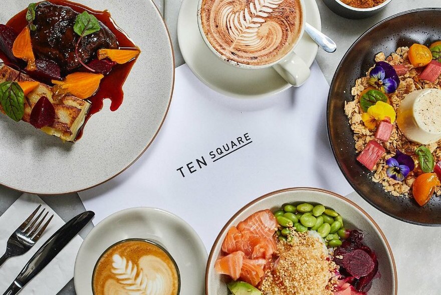 Various colourful dishes with Ten Square logo placed amongst them.