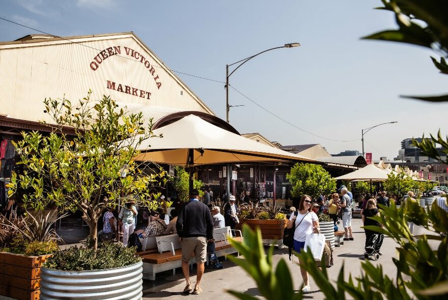 Shoppers outside Queen Victoria Market. 