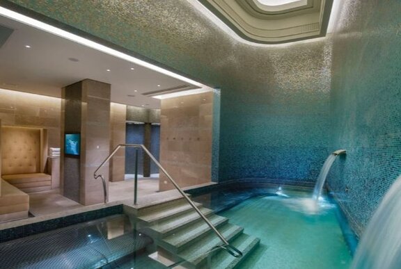 The spa at Crown Towers, with a deep pool and a comfortable booth area to relax in.