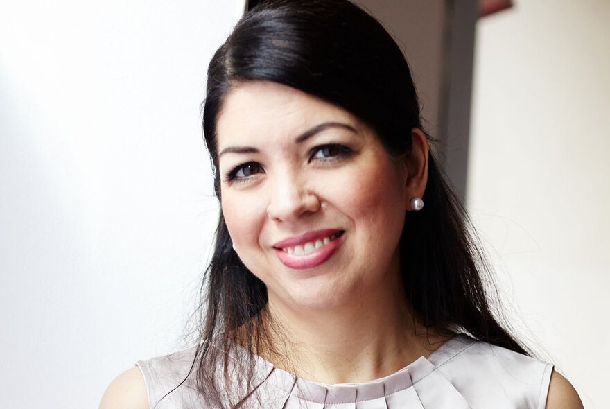 MSO concertmaster Natalie Chee smiling with her head tilted on the side. 