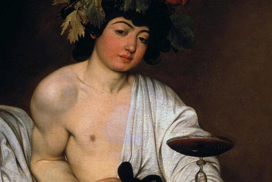 Oil painting of the god Dionysus by Caravaggio.