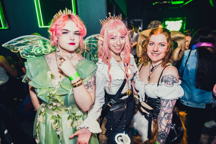 Eventgoers in cosplay outfits.