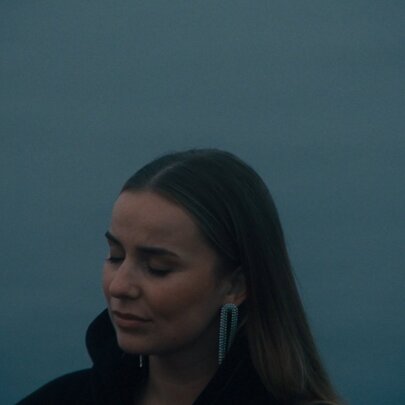 Singer and songwriter Ellen Bryant, looking peaceful with her eyes closed.
