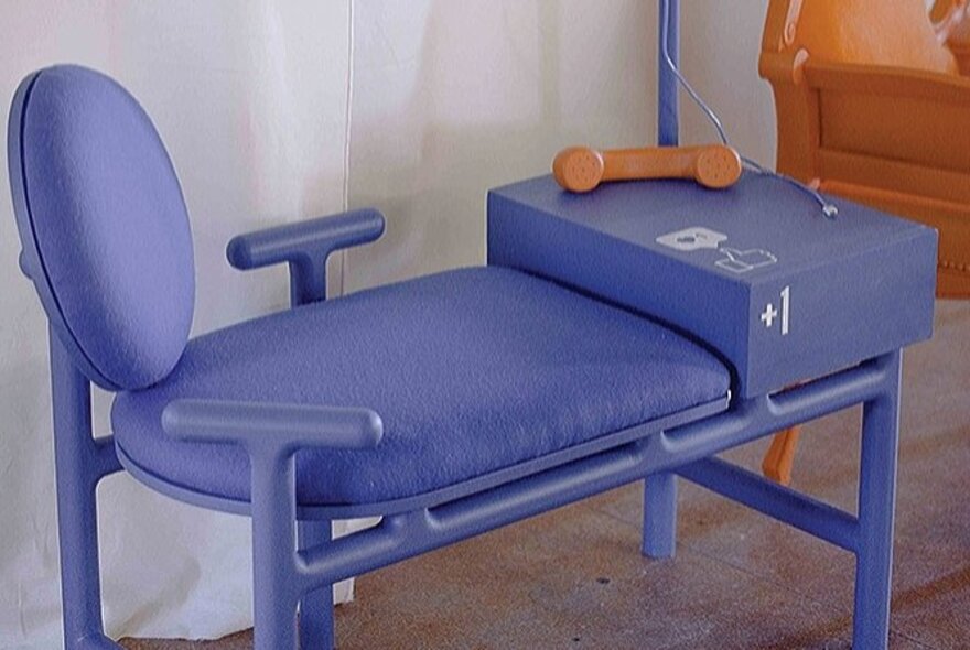 Purple seat with bench area and backrest.