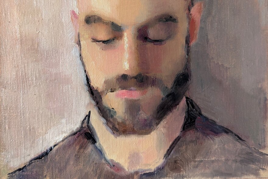 A realist still life oil portrait of a man with a beard, his eyes downcast. 