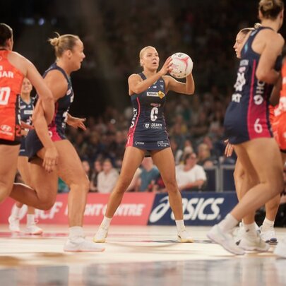 A netball match featuring the Melbourne Vixens and the Giants. 