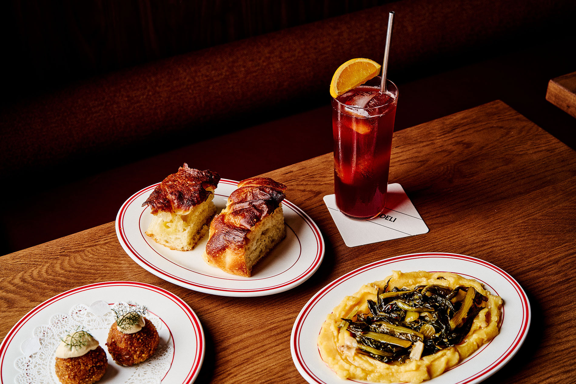 A selection of tapas and a cocktail.